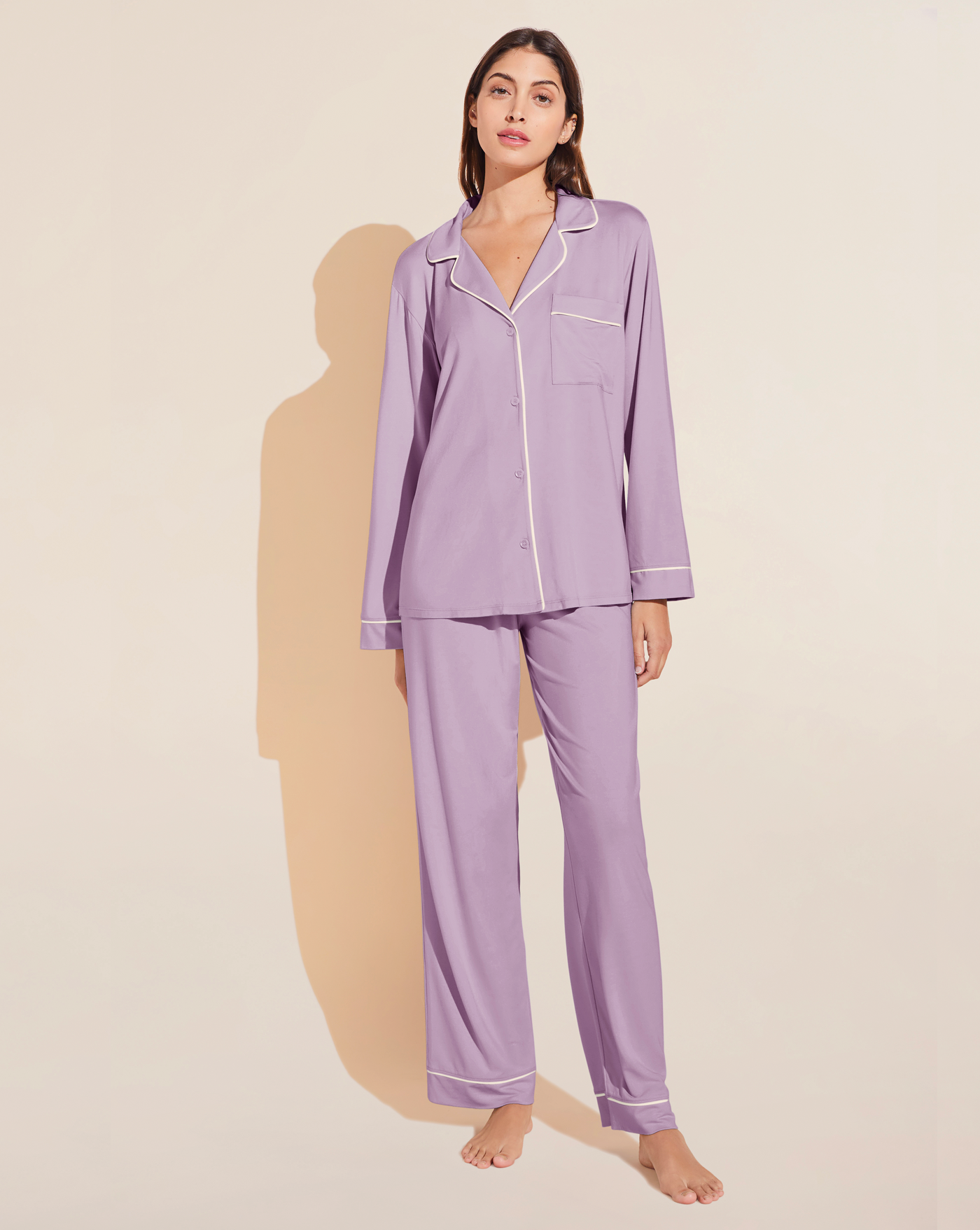 Classic long sleeve luxury pajama set with button front, collar and contrast piping in soft and comfortable lavender modal jersey.