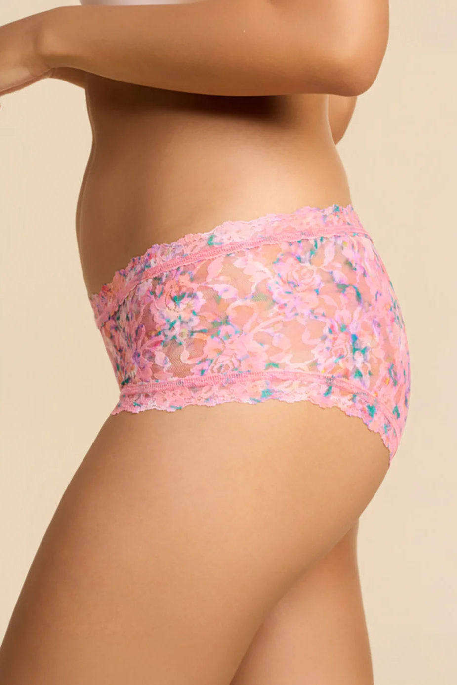 Pink lace underwear on a beige background