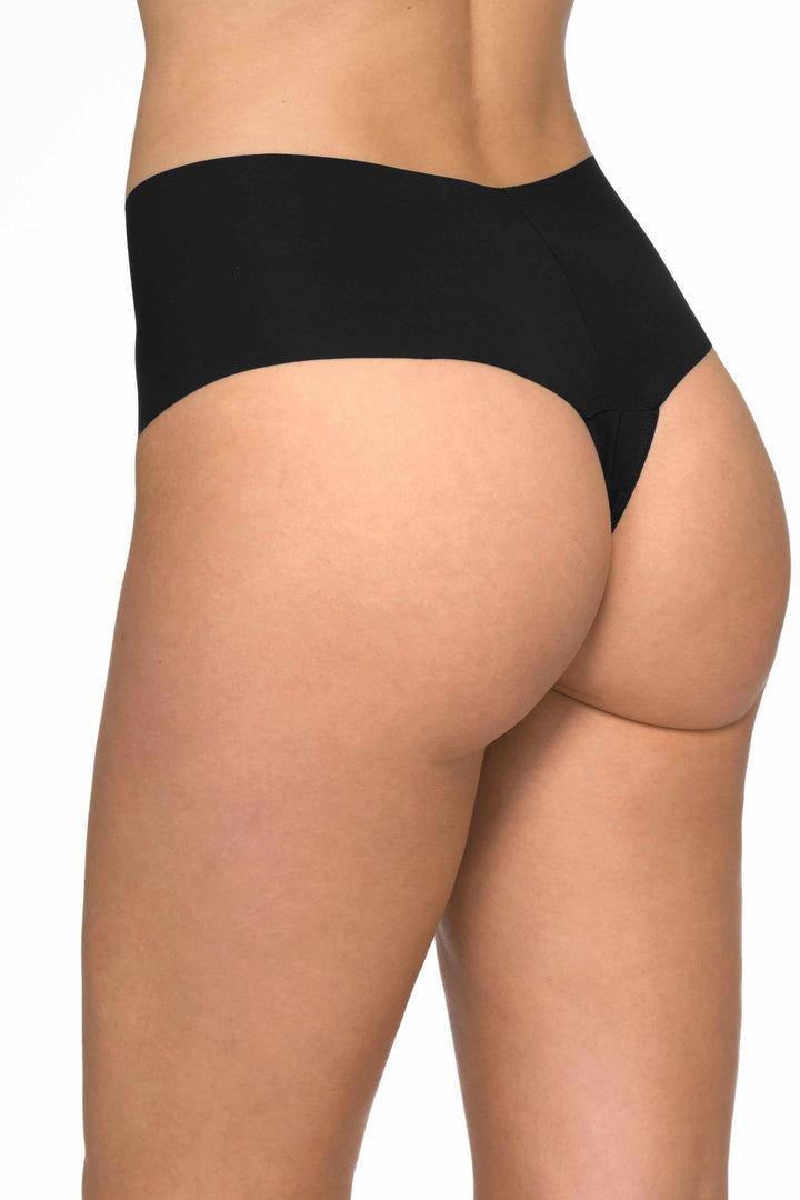 Black underwear worn by a person on a white background