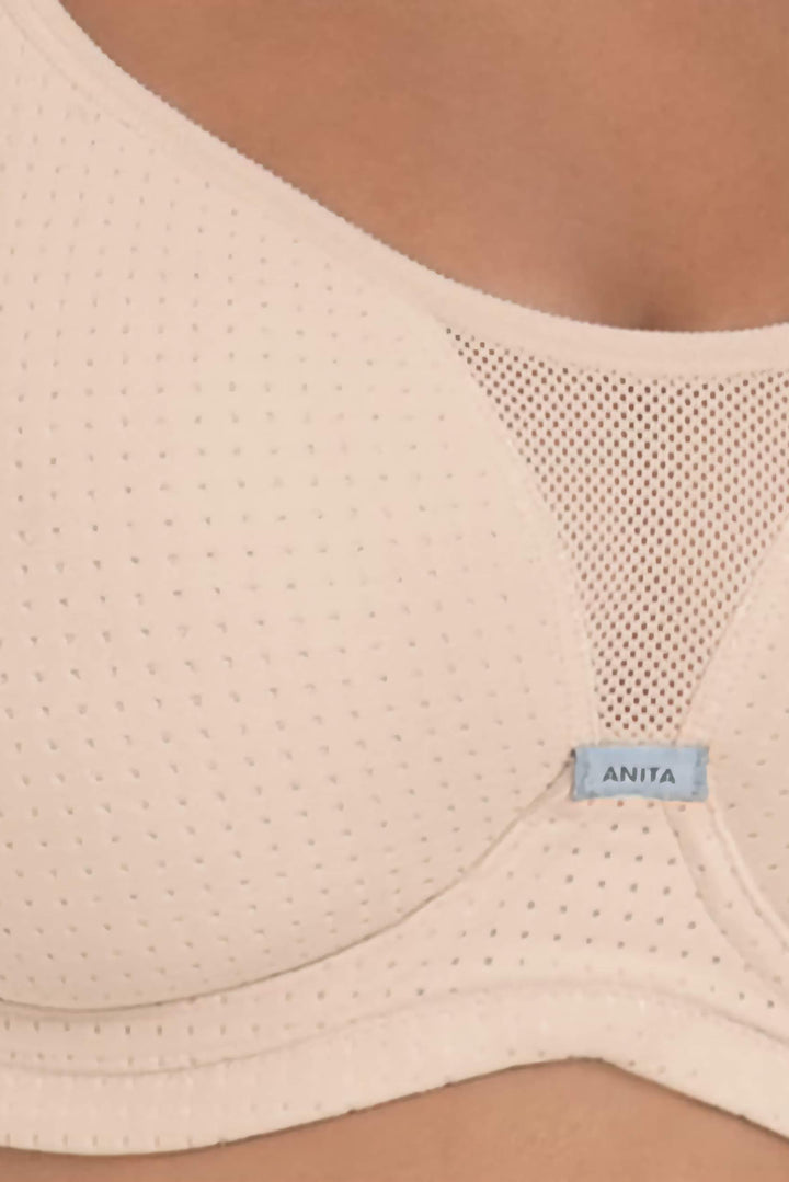 Pink sports bra with 'Anita' label on a plain background