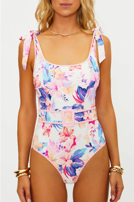 Multicolored floral swimsuit worn by a model on a white background