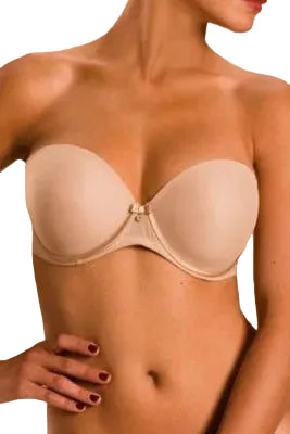 Beige strapless bra worn by a person on a beige background
