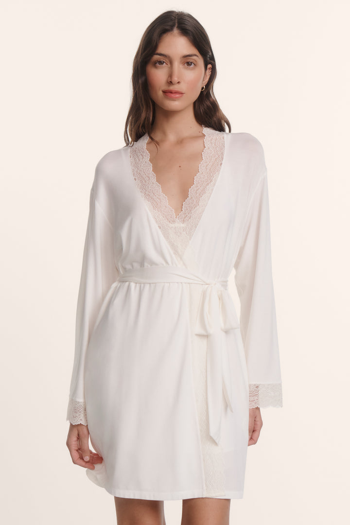 Woman wearing an eberjey lara lace slip robe in white. Pair with matching chemise or cami/short set.