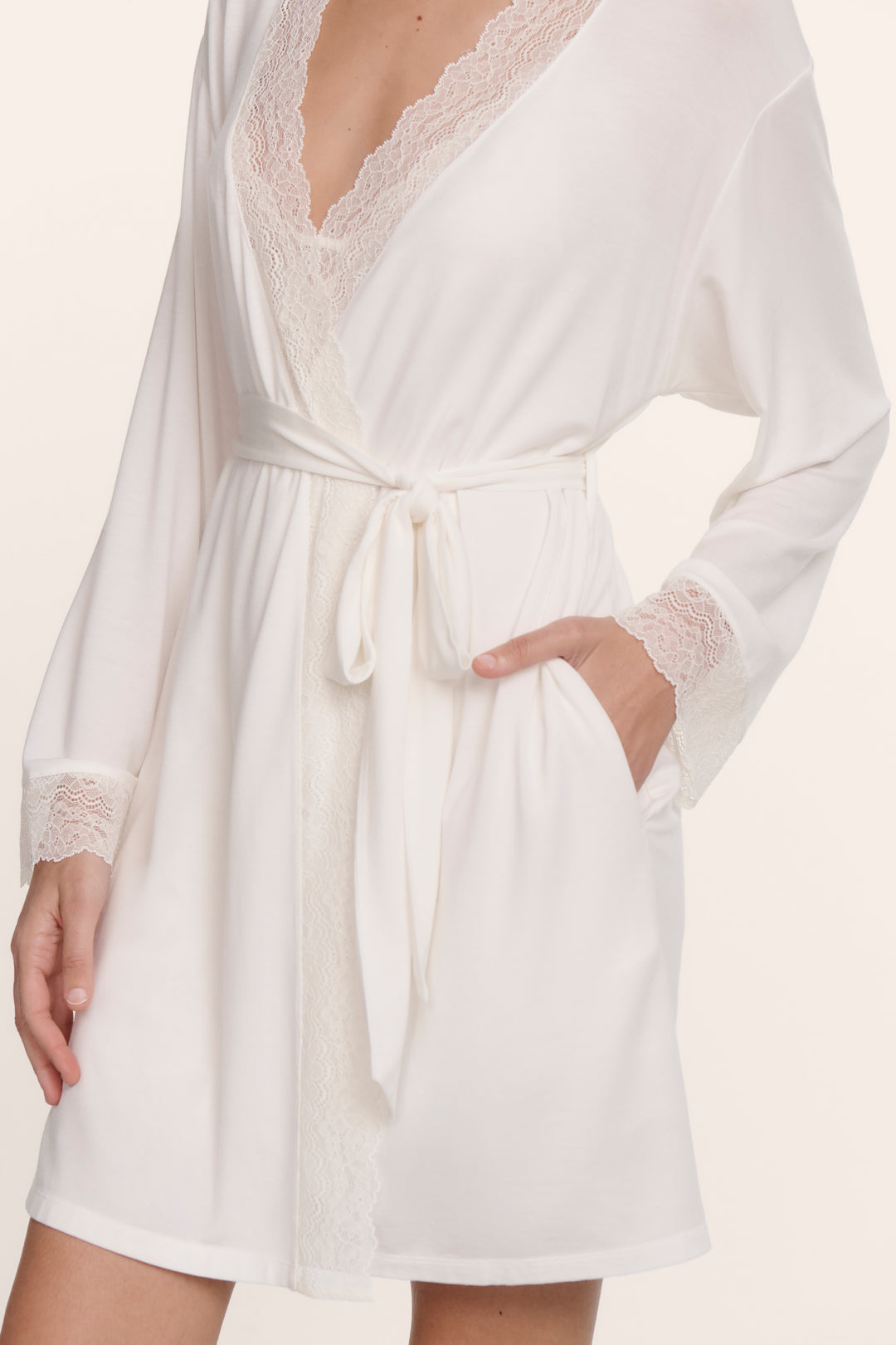 Woman wearing an eberjey lara lace slip robe in white. Pair with matching chemise or cami/short set.