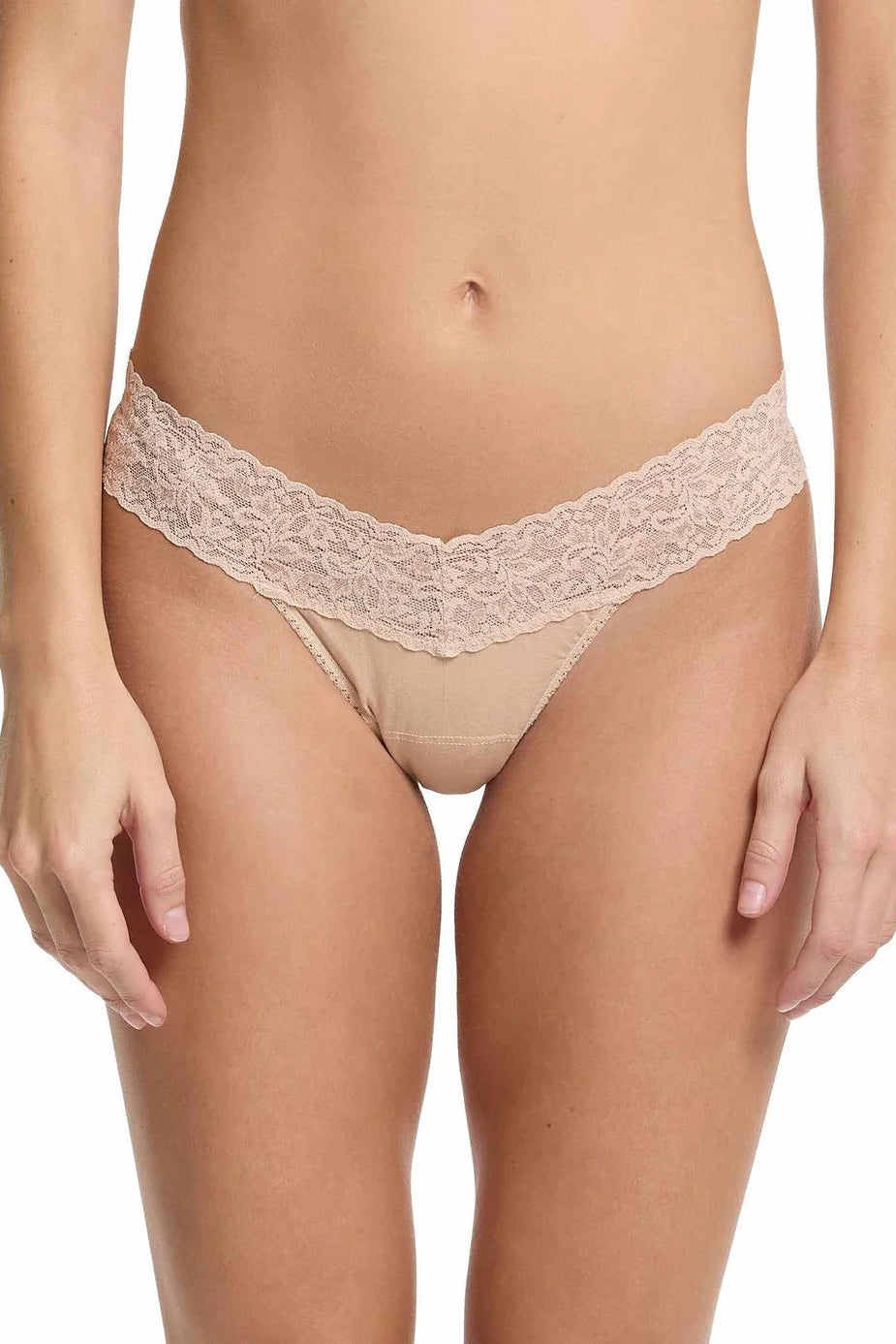 Beige lace cotton underwear on a white background
