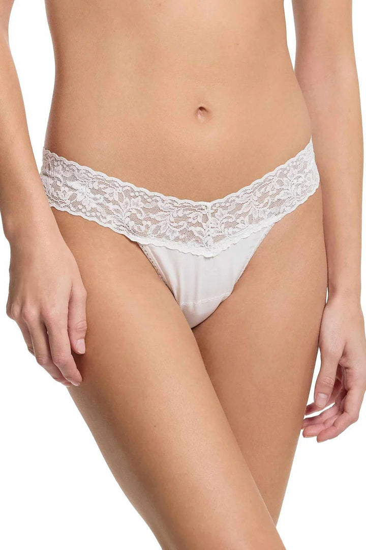 White lace cotton underwear on a white background