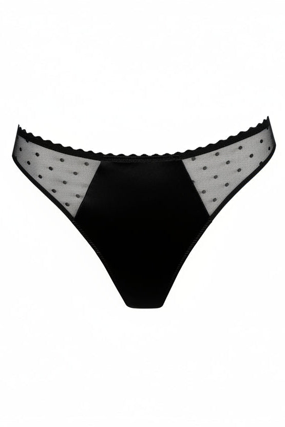 woman wearing a black thong with mesh detail on the side. Gorgeous matching underwear to Marie Jo Noova half padded balcony bra. Seamless and comfortable with cotton gusset. Sexy boudoir look. 