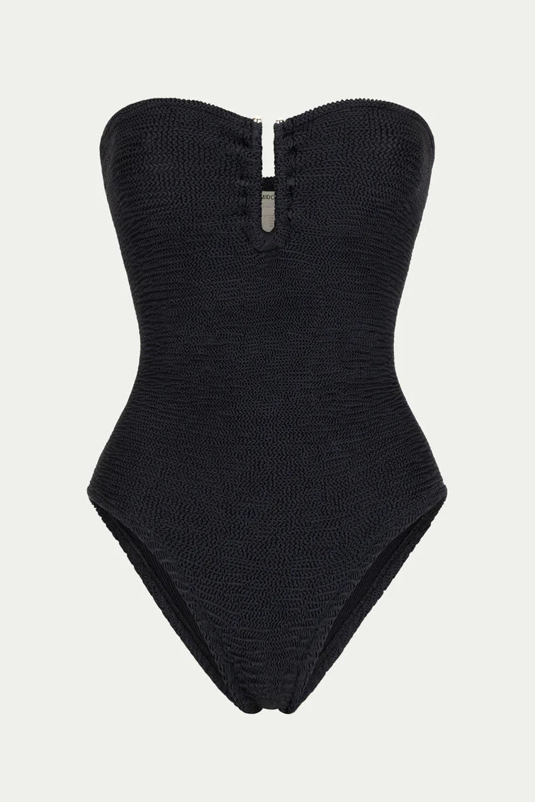 Black strapless swimsuit on a light gray background