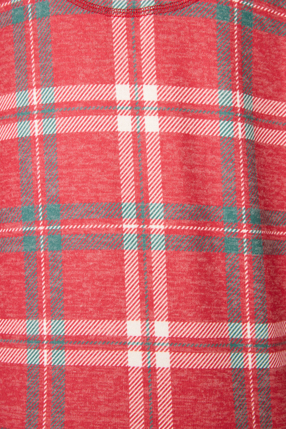 Close-up of a red plaid fabric with a checkered pattern