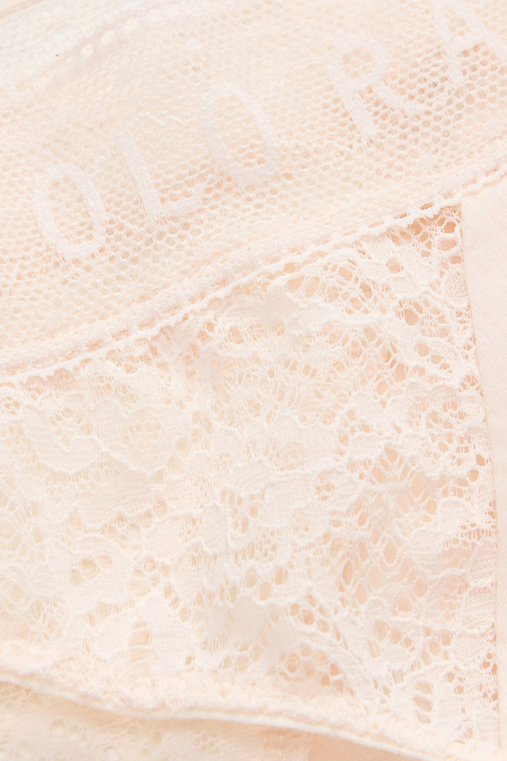 Close-up of pink lace fabric