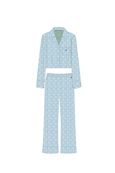 Light blue pajama set with white polka dots on a white background