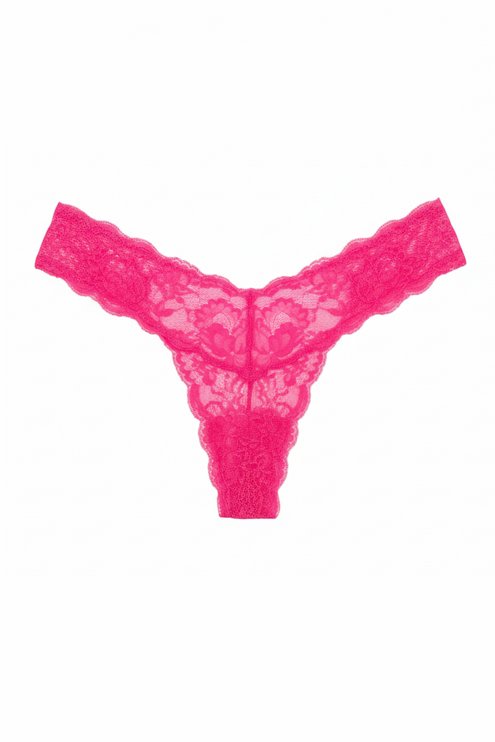 Pink lace thong on a white background