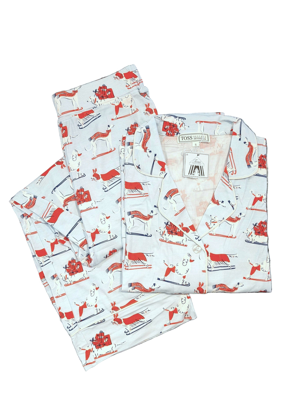 Set of red and white patterned fabric pajama with dogs on a white background