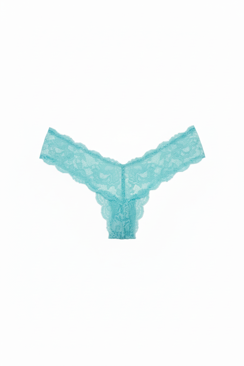 Tropica Turquoise Thong Flat Lay