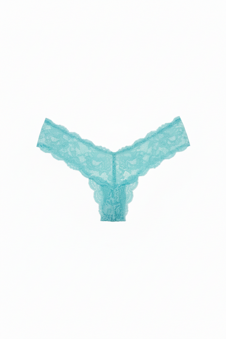 Tropica Turquoise Thong Flat Lay