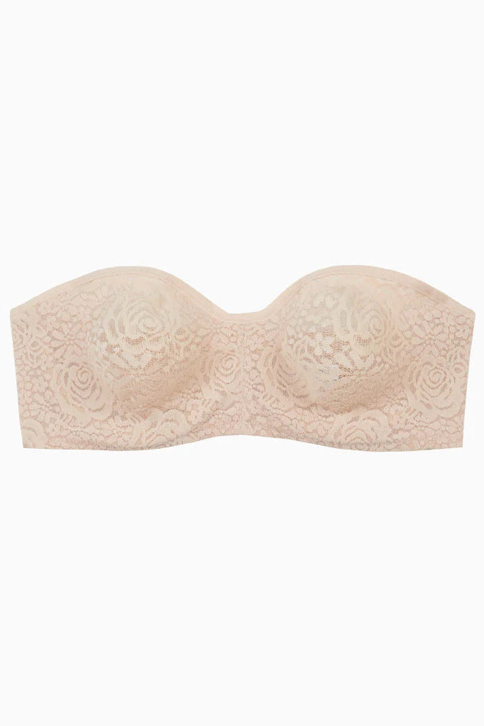 Beige strapless bra with floral lace details on a white background
